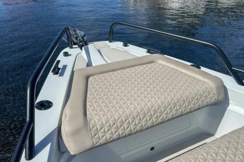 Kraken Yacht Photos Pics 2023 BRABUS Shadow 900 ST boat with quilted seating on calm water.
