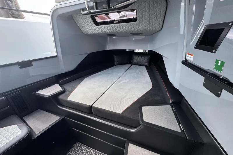 Kraken Yacht Photos Pics Interior cabin of 2023 BRABUS Shadow 900 ST, featuring sleek, modern design and comfortable seating.
