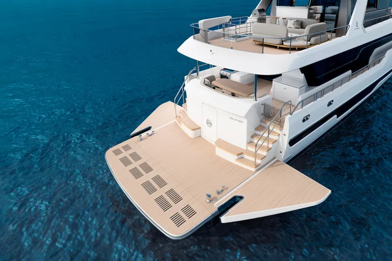  Yacht Photos Pics 2027 CL Yachts CLX99 luxury yacht on clear blue water, showcasing elegant design and spacious deck.