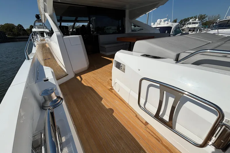 Yacht Photos Pics 2018 Sunseeker Predator 74 yacht deck with sleek design and luxurious seating.