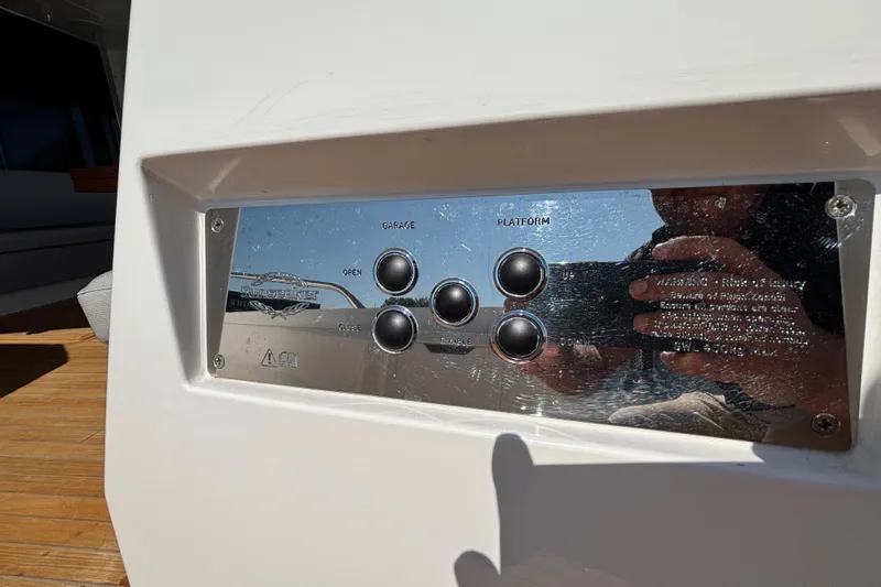  Yacht Photos Pics Control panel on 2018 Sunseeker Predator 74 yacht, featuring garage and platform buttons.