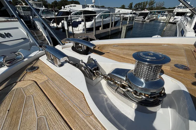  Yacht Photos Pics 2018 Sunseeker Predator 74 yacht deck with anchor chain and winch system.