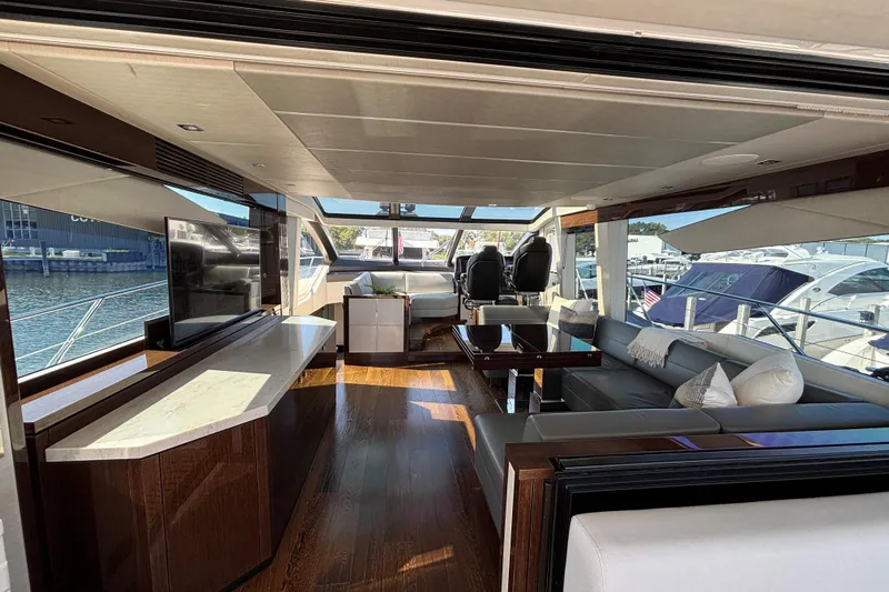  Yacht Photos Pics Luxurious interior of a 2018 Sunseeker Predator 74 yacht with elegant seating and modern design.