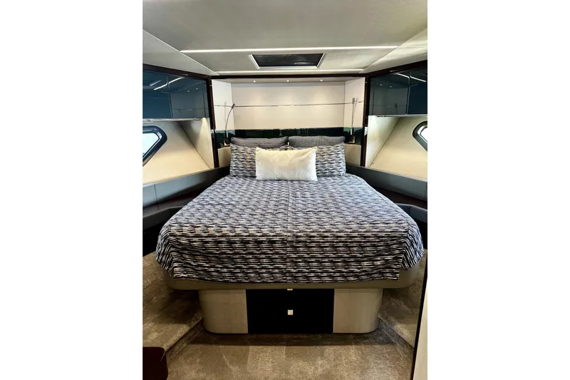  Yacht Photos Pics Luxurious bedroom interior of 2018 Sunseeker Predator 74 yacht with modern design.