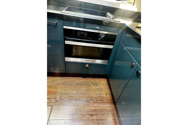  Yacht Photos Pics Modern kitchen in 2018 Sunseeker Predator 74 yacht with sleek cabinetry and built-in oven.