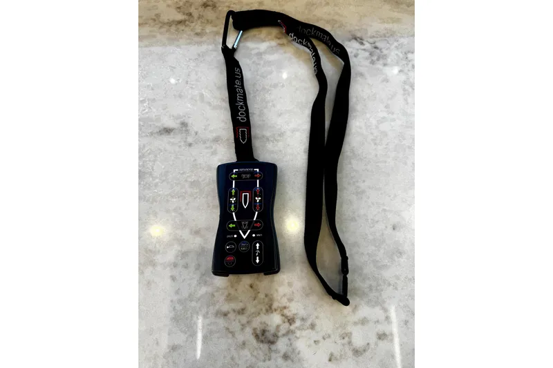  Yacht Photos Pics Remote control for Sunseeker Predator 74 yacht, 2018 model, on a marble surface.