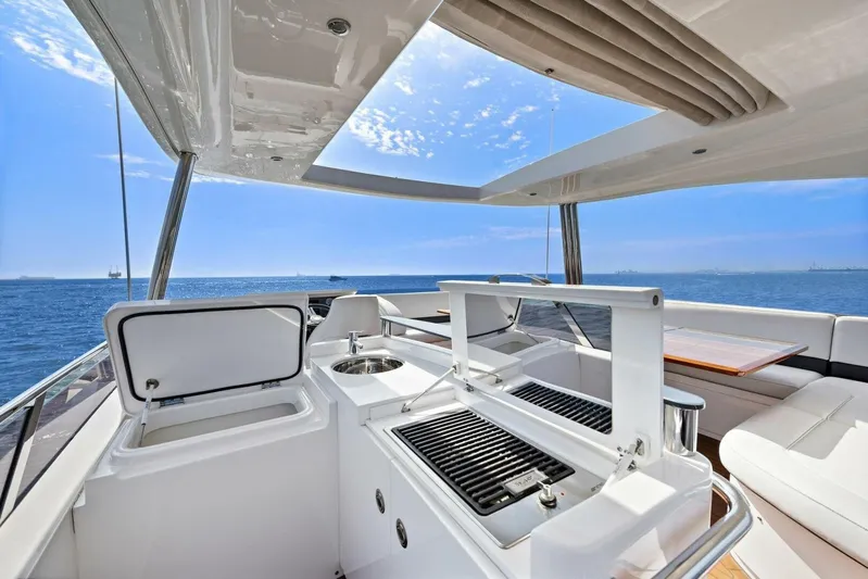 La-z-buoy Yacht Photos Pics Luxurious 2015 Princess 72 Motor Yacht with outdoor kitchen and ocean view.