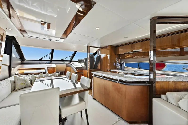 La-z-buoy Yacht Photos Pics Luxurious interior of 2015 Princess 72 Motor Yacht with modern dining and kitchen area.