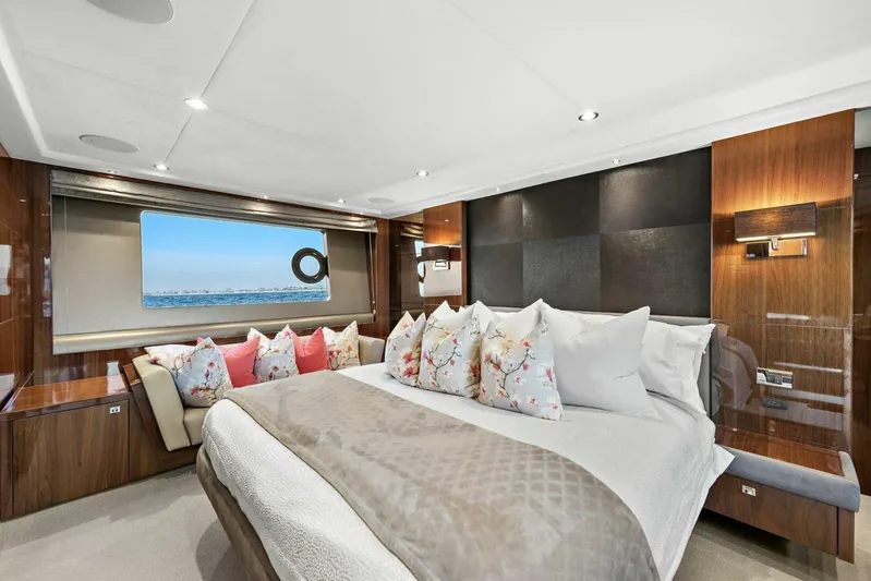 La-z-buoy Yacht Photos Pics Luxurious bedroom interior of 2015 Princess 72 Motor Yacht with ocean view window.
