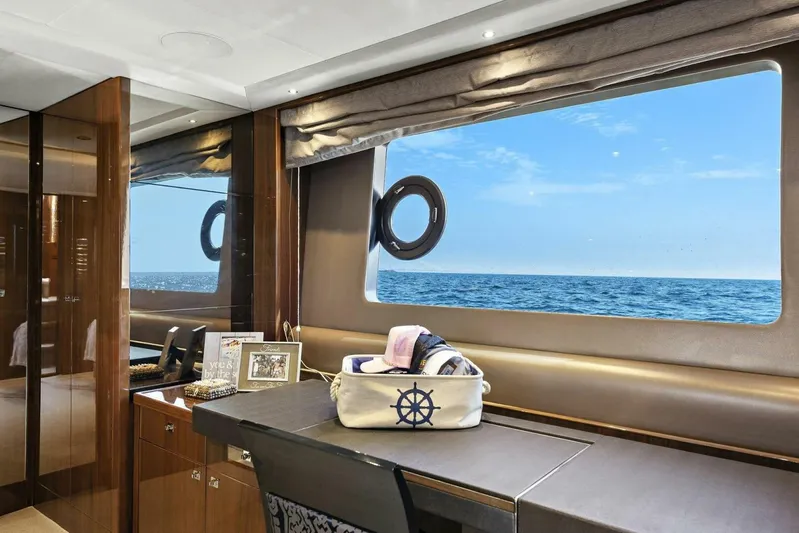 La-z-buoy Yacht Photos Pics Luxurious interior of 2015 Princess 72 Motor Yacht with ocean view through large window.