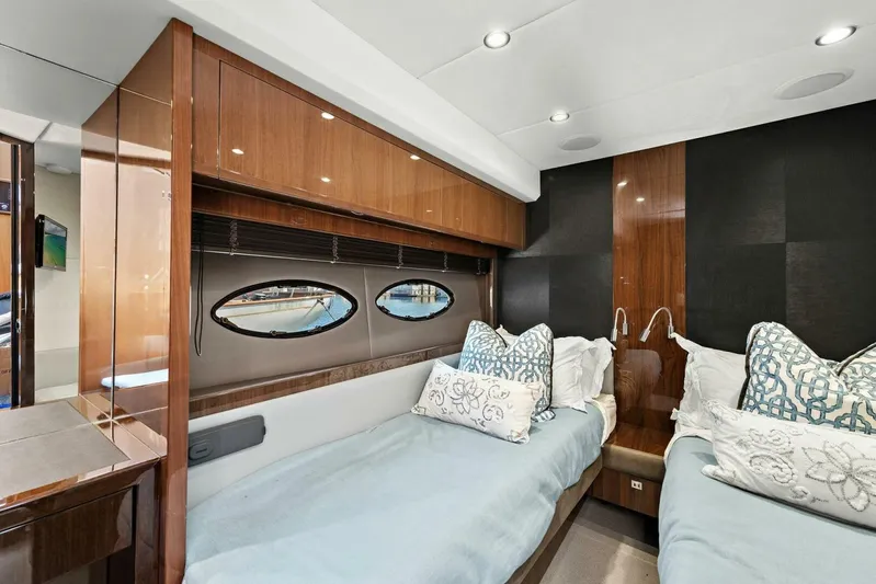 La-z-buoy Yacht Photos Pics Luxurious cabin interior of 2015 Princess 72 Motor Yacht with twin beds and elegant decor.