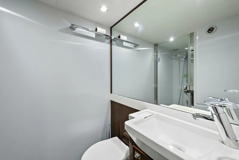 La-z-buoy Yacht Photos Pics Luxurious bathroom in 2015 Princess 72 Motor Yacht with modern fixtures and sleek design.