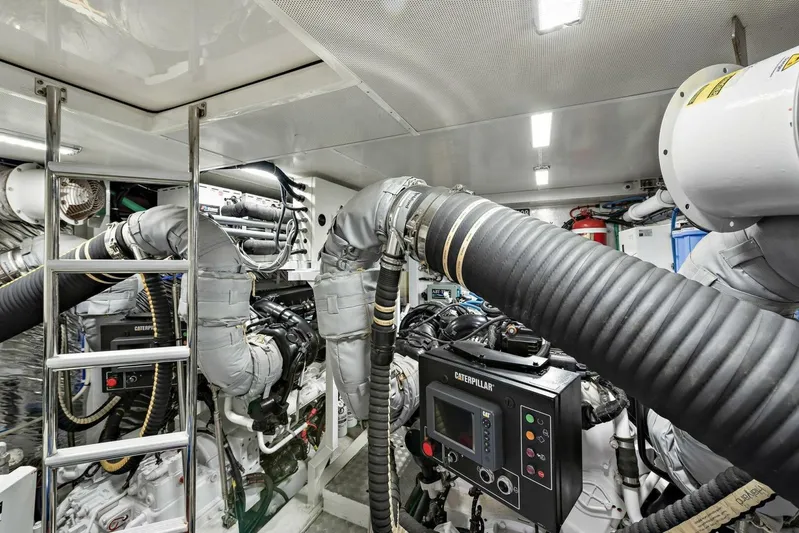La-z-buoy Yacht Photos Pics Engine room of 2015 Princess 72 Motor Yacht with Caterpillar machinery and ventilation system.