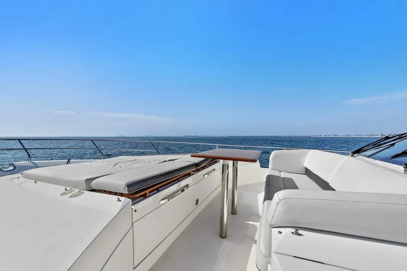 La-z-buoy Yacht Photos Pics Luxurious 2015 Princess 72 Motor Yacht deck with seating and ocean view.