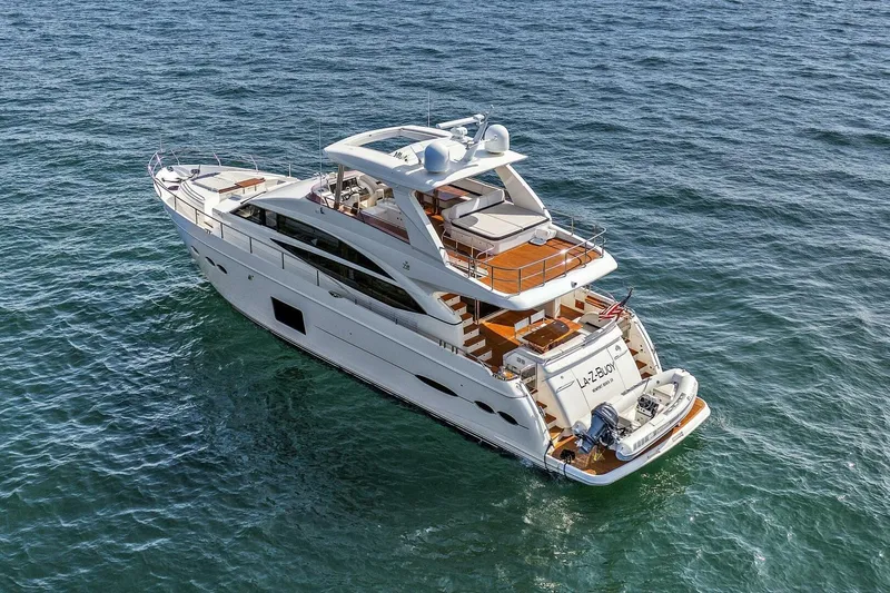 La-z-buoy Yacht Photos Pics Luxurious 2015 Princess 72 Motor Yacht cruising on open water.