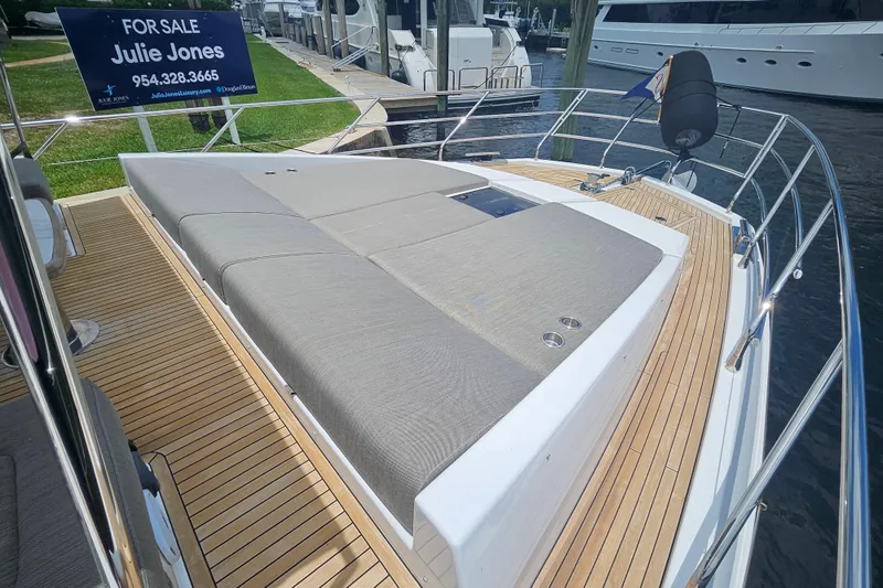  Yacht Photos Pics 2022 Azimut 66 yacht for sale, featuring spacious deck and luxurious sunbathing area.