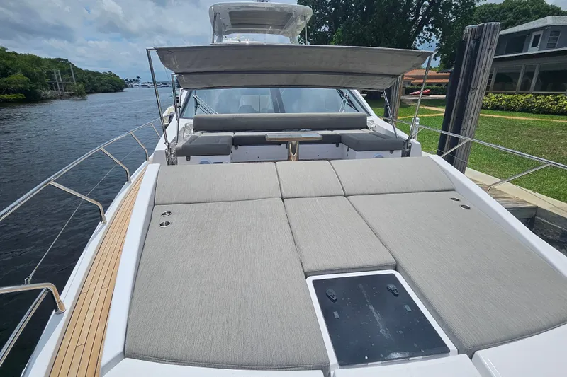  Yacht Photos Pics Luxurious 2022 Azimut 66 yacht with spacious sunbathing deck and elegant design.