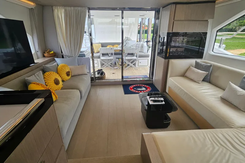  Yacht Photos Pics Luxurious interior of 2022 Azimut 66 yacht with modern seating and decor.