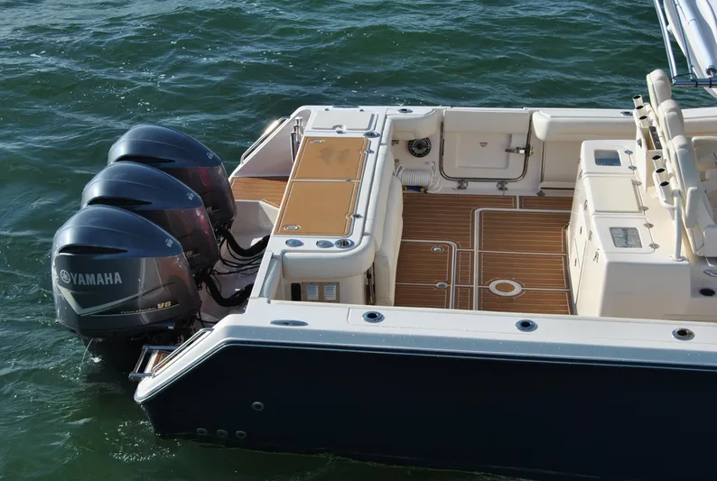  Yacht Photos Pics 2018 Grady-White Canyon 376 boat with Yamaha outboard engines on water.
