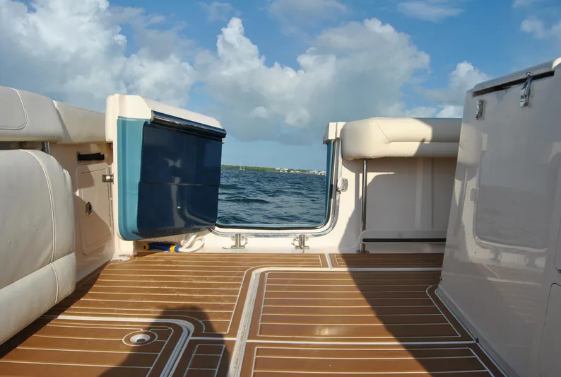  Yacht Photos Pics 2018 Grady-White Canyon 376 boat deck with ocean view and clear sky.