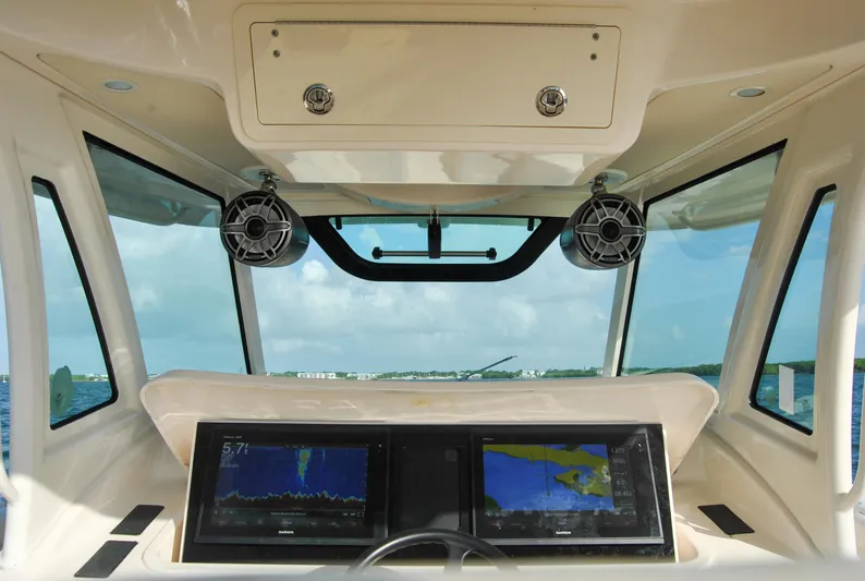  Yacht Photos Pics 2018 Grady-White Canyon 376 helm with dual navigation screens and ocean view.