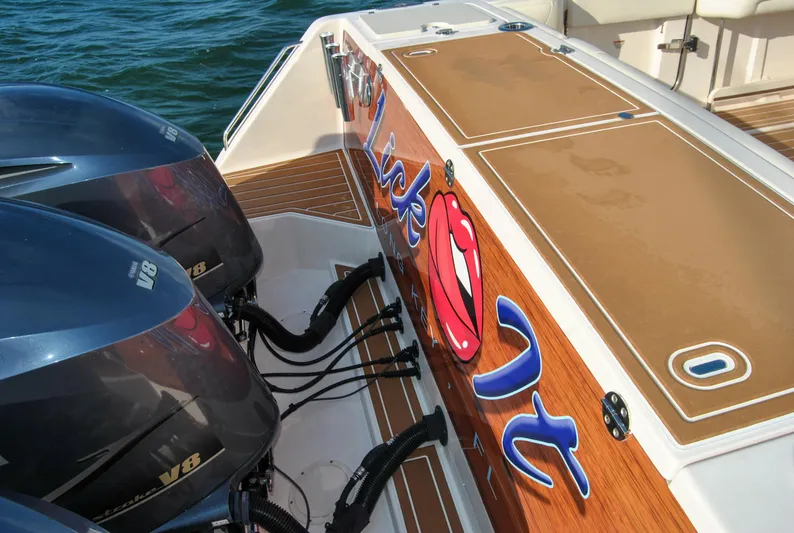  Yacht Photos Pics 2018 Grady-White Canyon 376 boat with twin V8 engines, custom graphics, and teak deck.