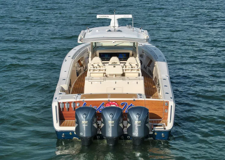 Yacht Photos Pics 2018 Grady-White Canyon 376 boat with triple outboard engines on water.
