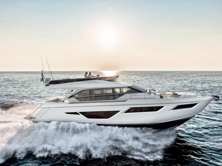  Yacht Photos Pics 2025 Ferretti Yachts 580 cruising on open sea at sunset.