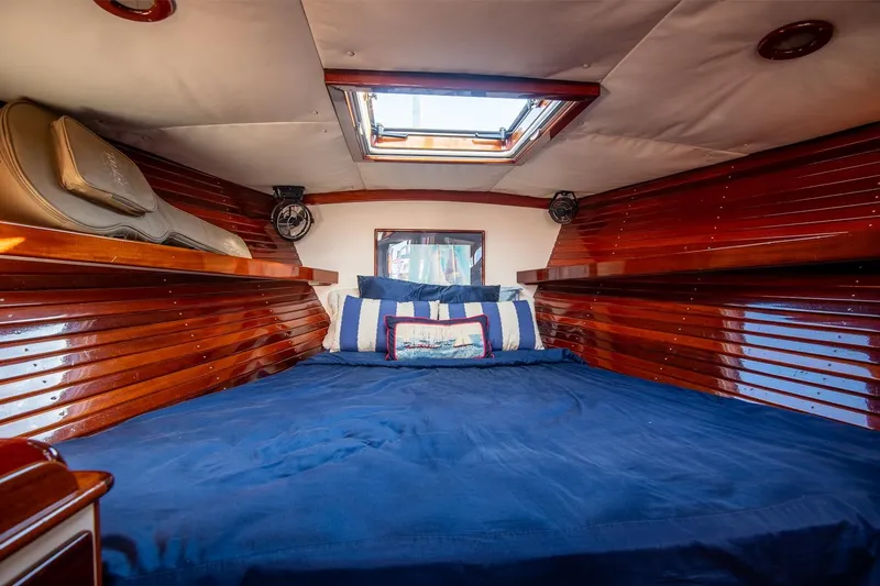 Dream Girl Yacht Photos Pics Luxurious cabin interior of 2007 Morris Yachts M42 with polished wood and skylight.