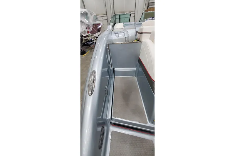  Yacht Photos Pics 2011 Formula 310 FX5 Bowrider interior view in a showroom setting.