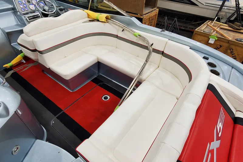  Yacht Photos Pics 2011 Formula 310 FX5 Bowrider interior with white seating and red accents.