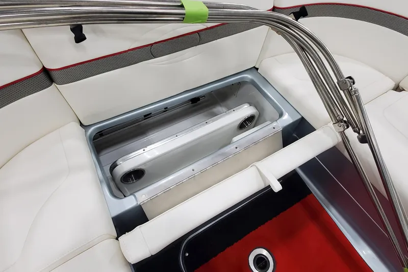  Yacht Photos Pics 2011 Formula 310 FX5 Bowrider interior seating with storage compartment and stainless steel railings.