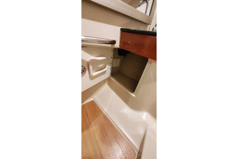  Yacht Photos Pics Interior of 2011 Formula 310 FX5 Bowrider, featuring a compact sink and storage area.