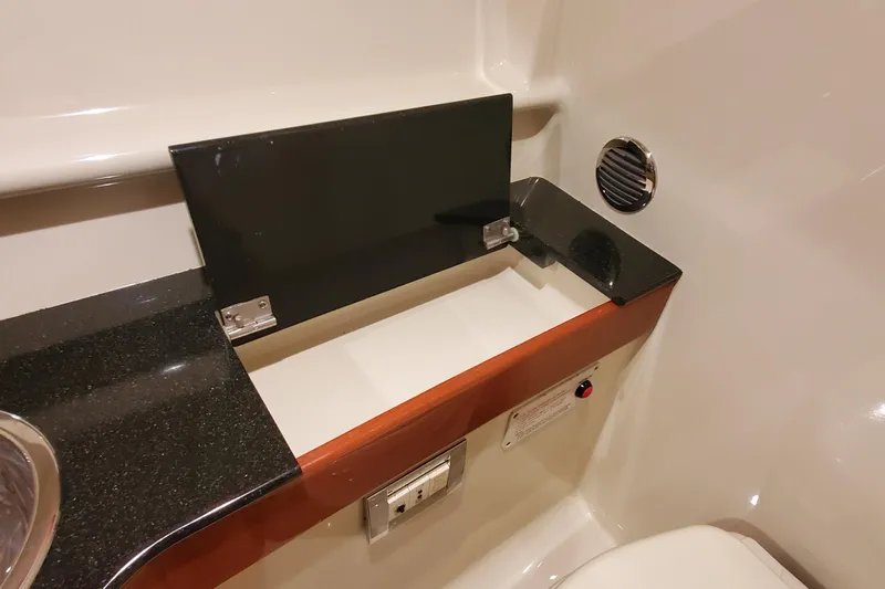  Yacht Photos Pics 2011 Formula 310 FX5 Bowrider interior with sleek black and wood accents.