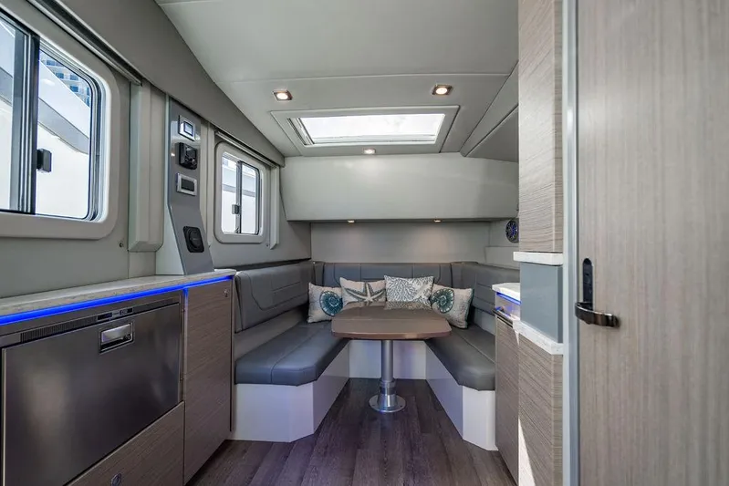  Yacht Photos Pics 2019 Formula 430 All Sport Crossover interior with modern seating and skylight.