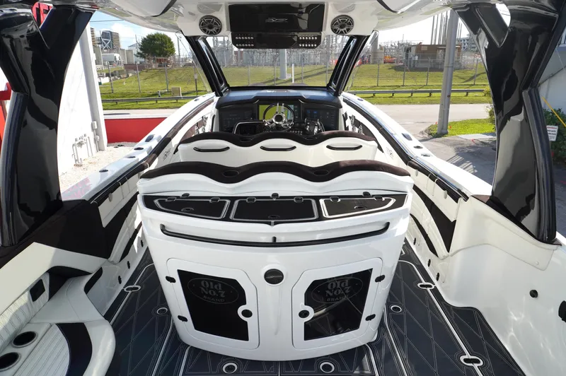  Yacht Photos Pics 2021 MTI V42 boat interior with sleek design and modern dashboard.