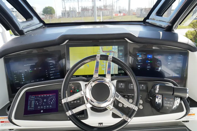  Yacht Photos Pics Helm of 2021 MTI V42 boat with advanced navigation and control systems.