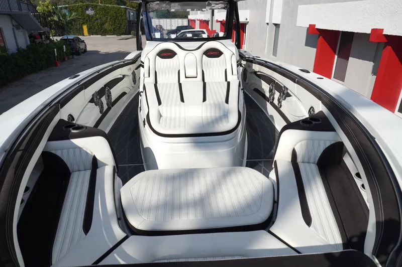  Yacht Photos Pics Luxury MTI V42 boat interior with white seating, 2021 model.