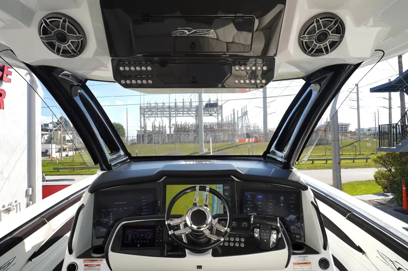  Yacht Photos Pics Cockpit view of 2021 MTI V42 boat with advanced navigation and control systems.