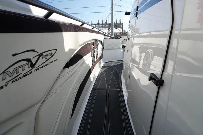  Yacht Photos Pics 2021 MTI V42 boat deck with sleek design and logo detailing.