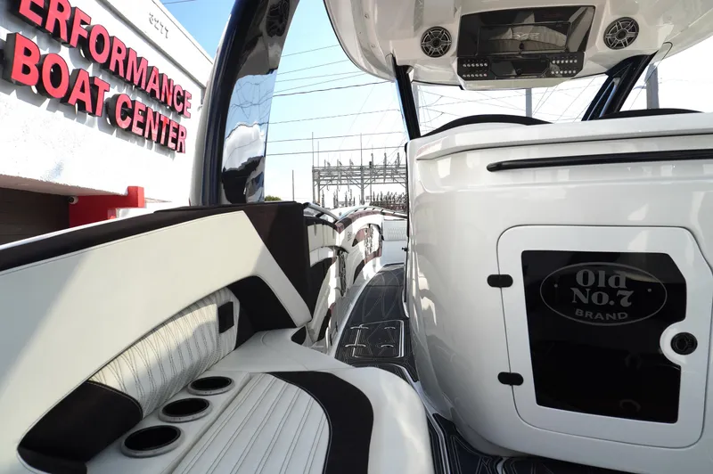  Yacht Photos Pics Interior of 2021 MTI V42 boat at Performance Boat Center, showcasing sleek design and seating.