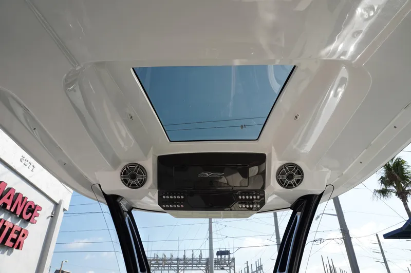  Yacht Photos Pics Rooftop view of 2021 MTI V42 boat with speakers and skylight.