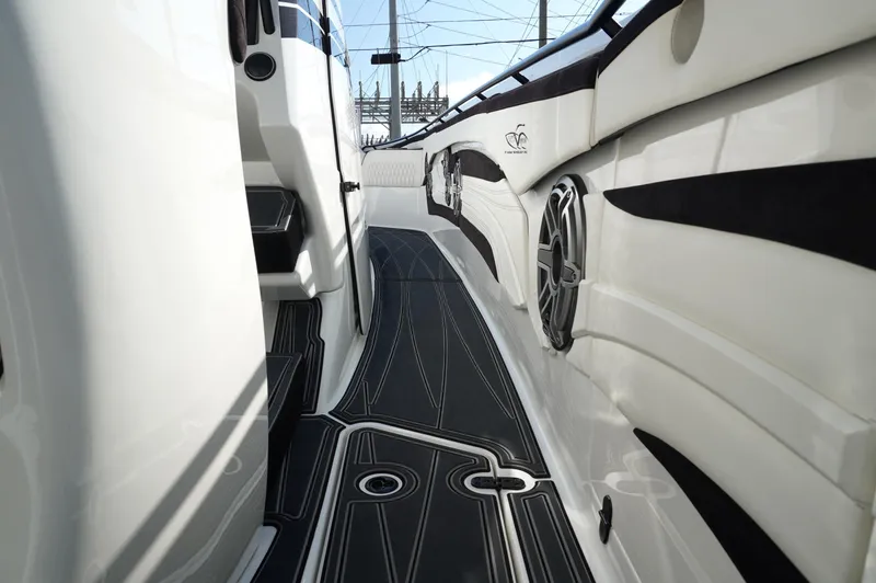  Yacht Photos Pics Sleek interior of 2021 MTI V42 boat with modern design and black accents.