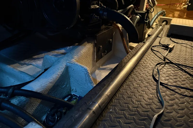 Lady Jake Yacht Photos Pics Engine compartment of 1985 Bayliner 4550 Motoryacht with visible cables and components.