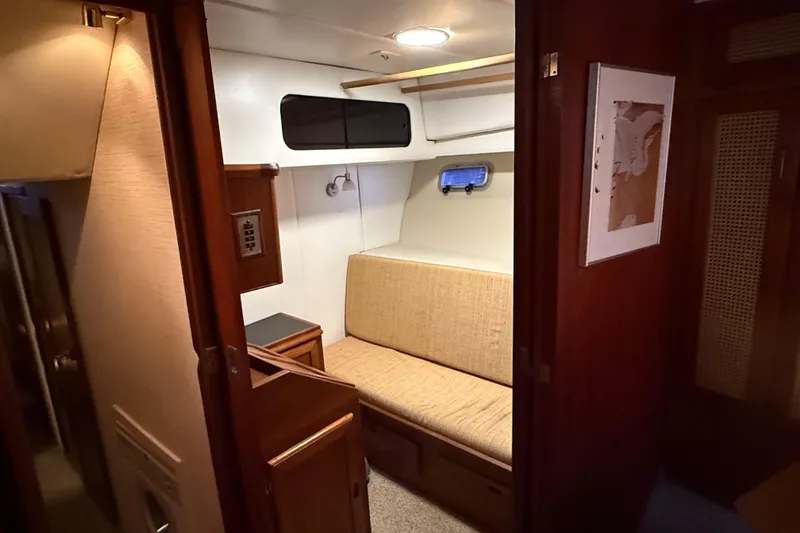 Lady Jake Yacht Photos Pics Interior of 1985 Bayliner 4550 Motoryacht with cozy seating and wooden accents.
