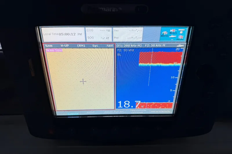 Lady Jake Yacht Photos Pics Sonar display on 1985 Bayliner 4550 Motoryacht showing depth and navigation data.