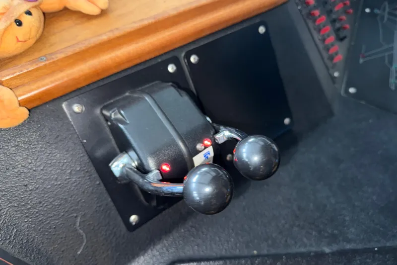 Lady Jake Yacht Photos Pics Throttle controls on a 1985 Bayliner 4550 Motoryacht dashboard.