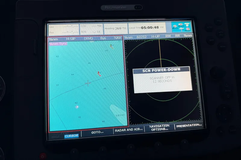 Lady Jake Yacht Photos Pics Navigation display on 1985 Bayliner 4550 Motoryacht showing radar and map interface.