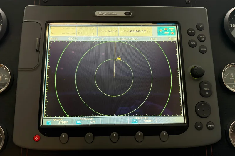 Lady Jake Yacht Photos Pics Raymarine radar display on 1985 Bayliner 4550 Motoryacht, showing navigation data and controls.