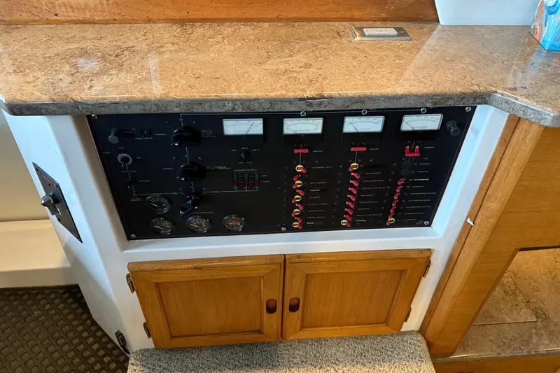 Lady Jake Yacht Photos Pics Control panel of a 1985 Bayliner 4550 Motoryacht with gauges and switches.